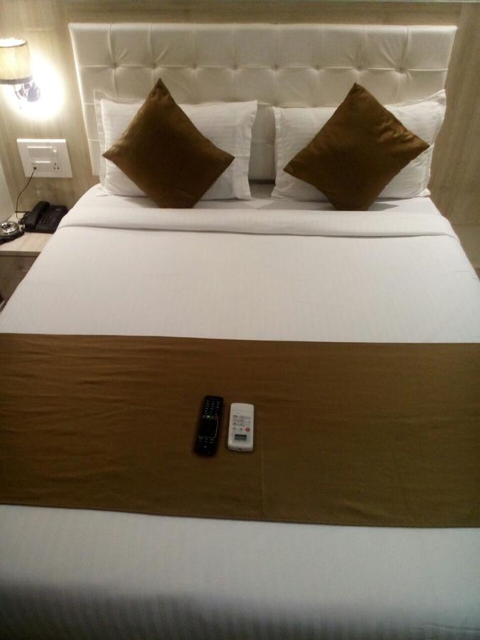 Hotel Grace Inn Мумбаї Номер фото